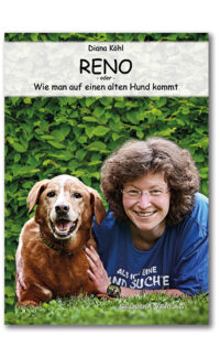 Das Cover von RENO zeigt den gleichnamigen Hund mit seinem Frauchen auf der Wiese liegen